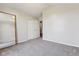 Neutral bedroom space featuring carpet flooring, a large mirror, and closet with plenty of space at 1105 Wild Ridge Blvd, Brownsburg, IN 46112