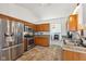 Functional kitchen featuring stainless steel appliances and tiled backsplash at 1105 Wild Ridge Blvd, Brownsburg, IN 46112