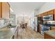 Well-equipped kitchen featuring stainless steel appliances and a cozy dining area at 1105 Wild Ridge Blvd, Brownsburg, IN 46112