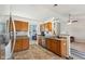 Bright kitchen offering a view of the living room and stainless steel appliances at 1105 Wild Ridge Blvd, Brownsburg, IN 46112