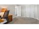 Office space with desk and chair, carpet flooring, and open doorway at 1105 Wild Ridge Blvd, Brownsburg, IN 46112