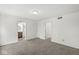 Spacious bedroom with neutral carpet, multiple closets, and an ensuite bathroom at 1106 Fox Trail W Dr, New Palestine, IN 46163