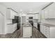 Remodeled kitchen boasts granite counters, stainless appliances, and a center island at 1106 Fox Trail W Dr, New Palestine, IN 46163
