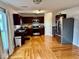 Spacious kitchen with dark wood cabinetry, stainless steel appliances, and ample counter space at 1112 W Nature Pointe Ln, Muncie, IN 47304