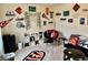 Recreation room with a loveseat, a novelty chair, and sports memorabilia on the wall at 1112 W Nature Pointe Ln, Muncie, IN 47304