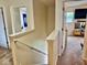 Well-maintained stairway leading to the upper level, featuring carpeted steps and neutral decor at 1112 W Nature Pointe Ln, Muncie, IN 47304