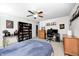 This spacious bedroom features neutral walls, carpeted floors, and a cozy bed with a plush blue blanket at 11121 Godfrey Dr, Noblesville, IN 46060