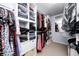 Walk-in closet featuring built-in shelving and a mirror for added convenience at 11121 Godfrey Dr, Noblesville, IN 46060