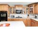Spacious kitchen with stainless steel appliances, gas range, and ample countertop space at 11121 Godfrey Dr, Noblesville, IN 46060