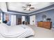 A spacious main bedroom offers ample natural light and neutral carpet at 11121 Godfrey Dr, Noblesville, IN 46060