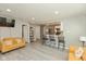 Bright living room featuring barstool seating and contemporary design at 1215 N Pershing Ave, Indianapolis, IN 46222