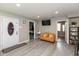 Comfortable living room showcasing new flooring and ample natural light at 1215 N Pershing Ave, Indianapolis, IN 46222