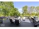 Large deck with lounge seating and outdoor kitchen at 12399 Lynnwood Blvd, Carmel, IN 46033