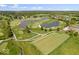 Expansive golf course view featuring lush green fairways, serene water hazards, and meticulously manicured landscaping at 12399 Lynnwood Blvd, Carmel, IN 46033