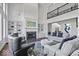 Bright, expansive living room with fireplace and built-in shelving at 12399 Lynnwood Blvd, Carmel, IN 46033