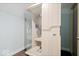 Home sauna featuring glass door, wood benches, and control panel at 12399 Lynnwood Blvd, Carmel, IN 46033