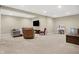 Finished basement features neutral carpeting and recessed lighting with comfortable seating arrangements at 125 W Chalet Dr, Mooresville, IN 46158