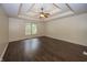 Spacious bedroom with ceiling fan and trim and large window at 1297 Morningside Dr, Greenfield, IN 46140