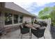 Outdoor patio featuring comfortable seating and a dining table for entertaining at 1297 Morningside Dr, Greenfield, IN 46140