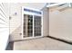 Back patio with sliding glass doors to the house at 13499 Molique Blvd, Fishers, IN 46037