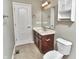 Bathroom with dark cabinets and a toilet at 13499 Molique Blvd, Fishers, IN 46037