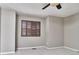 Neutral bedroom featuring shuttered window, soft carpet, and a ceiling fan at 13499 Molique Blvd, Fishers, IN 46037