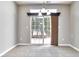 Dining area with sliding glass doors to the outdoor patio at 13499 Molique Blvd, Fishers, IN 46037