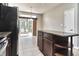Open kitchen with a granite island and view into the dining area at 13499 Molique Blvd, Fishers, IN 46037