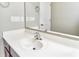 Close up of the bathroom vanity featuring a white counter and a chrome faucet at 13499 Molique Blvd, Fishers, IN 46037