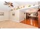 Open-concept living room showcases hardwood floors, built-in shelving, fireplace, and vaulted ceilings at 1426 S Anderson St, Elwood, IN 46036