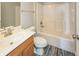 Clean bathroom with tub/shower combination and wood vanity with sink at 15447 Gallow Ln, Noblesville, IN 46060