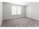 Neutral bedroom showcasing a bright window that provides soft natural light and neutral carpet at 15447 Gallow Ln, Noblesville, IN 46060
