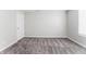 Neutral bedroom showcasing modern gray paint, neutral carpet and a bright window at 15447 Gallow Ln, Noblesville, IN 46060