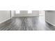 Bright living room with ample natural light, hard surface floors, and neutral paint at 15447 Gallow Ln, Noblesville, IN 46060