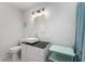 Modern bathroom boasts vessel sink, sleek vanity, and stylish fixtures at 155 N Franklin Rd, Indianapolis, IN 46219