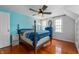 The bedroom features bright and airy feel with its large windows and painted walls at 155 N Franklin Rd, Indianapolis, IN 46219