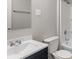 A standard bathroom with new vanity, new toilet, and shower-tub combo at 1602 Villa Ave, Indianapolis, IN 46203