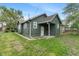 Charming home featuring green siding, white trim, and well-maintained landscaping at 1602 Villa Ave, Indianapolis, IN 46203