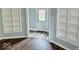 View of the hardwood floors and built-in shelving at 1715 S Madison St, Muncie, IN 47302