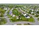 An aerial view of the property within a well-maintained residential community with mature trees and landscaping at 2154 Walnut Meadow Ct, Indianapolis, IN 46234