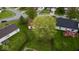 Aerial view showcasing the property's backyard, landscaping, and surrounding residential neighborhood at 2154 Walnut Meadow Ct, Indianapolis, IN 46234