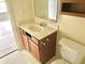 Bathroom featuring vanity with drawers for storage and view to adjoining room at 2154 Walnut Meadow Ct, Indianapolis, IN 46234
