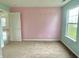 Bedroom featuring carpeted floors and walls painted in light blue and pink at 2154 Walnut Meadow Ct, Indianapolis, IN 46234