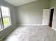 Bright bedroom with a large window for natural light and ceramic tile flooring at 2154 Walnut Meadow Ct, Indianapolis, IN 46234