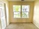 Bright bedroom featuring neutral walls with neutral carpet and large windows overlooking the landscape at 2154 Walnut Meadow Ct, Indianapolis, IN 46234
