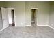 Bedroom with tile floor and featuring multiple doors for closet and bathrooms at 2154 Walnut Meadow Ct, Indianapolis, IN 46234