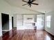 Bright living room featuring hardwood floors, built-in shelving, and plenty of natural light at 2154 Walnut Meadow Ct, Indianapolis, IN 46234