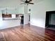 Open concept living space with hardwood floors and seamless access to the kitchen at 2154 Walnut Meadow Ct, Indianapolis, IN 46234