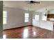 Bright living room with hardwood floors and large windows, offering a comfortable and welcoming space at 2154 Walnut Meadow Ct, Indianapolis, IN 46234