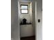 Charming coffee nook with white cabinets, dark countertops, and a window for natural light at 2161 N Pennsylvania N St, Indianapolis, IN 46202